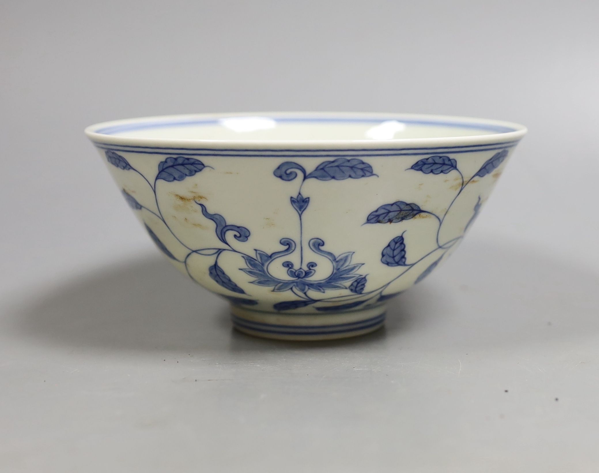 A Chinese blue and white bowl, 14 cms diameter.